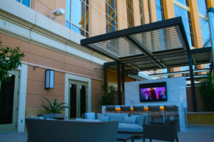 An image of a louvered roof over an outdoor living space done by Apollo