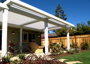 A transformed outdoor living space with a louvered patio from Apollo Opening Roof