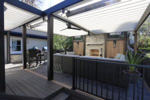 A transformed outdoor living space with a louvered patio from Apollo