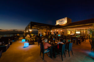 An image of a louvered patio for restaurants at night from Apollo Opening Roof