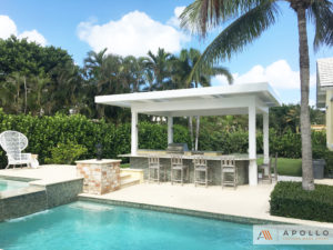 Backyard louvered pergola