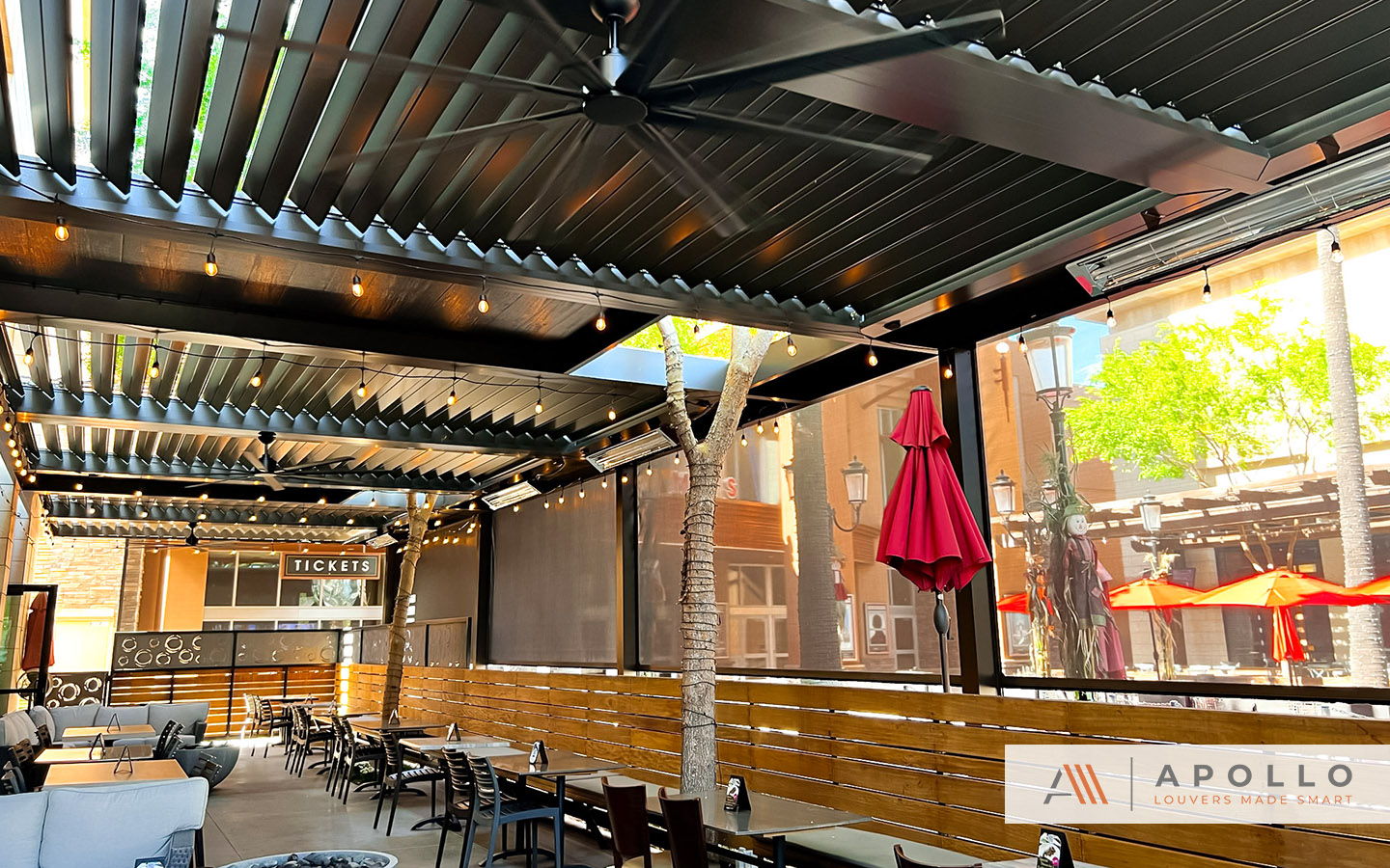 Image of an adjustable louvered pergola providing shade and a comfortable outdoor dining experience at the Back Bistro restaurant.