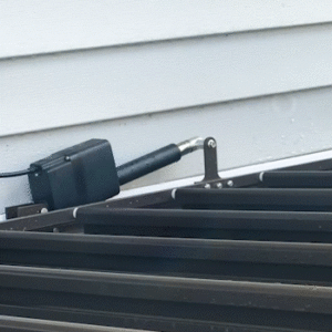 View of an Apollo louvered roof from above, showing the motor attachment and louver operation.