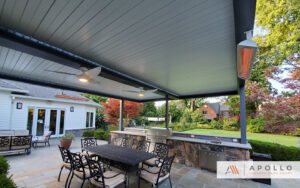 Louvered Pergola Over Outdoor Cooking and Dining Area