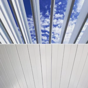 Louvered pergola slats open to a blue sky with white clouds with closed position below.
