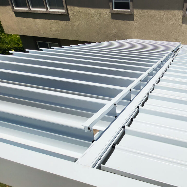 Close-up of modern louvered patio ceiling with built-in LED lighting