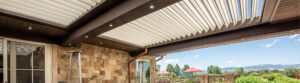 Motorized louvered pergola roof with adjustable aluminum slats