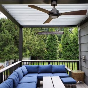 Pergola-covered patio with outdoor sectional sofa and heater