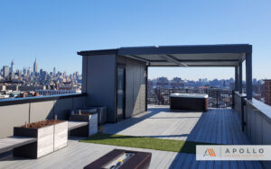 Rooftop pergola with hot tub overlooking a modern city skyline