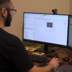 Apollo engineer reviewing louvered pergola shop drawings in Revit