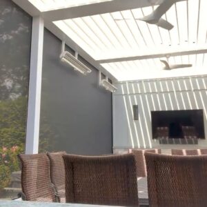 White aluminum louvered pergola over an outdoor dining area with motorized screens, wall-mounted heaters, ceiling fan, and outdoor TV